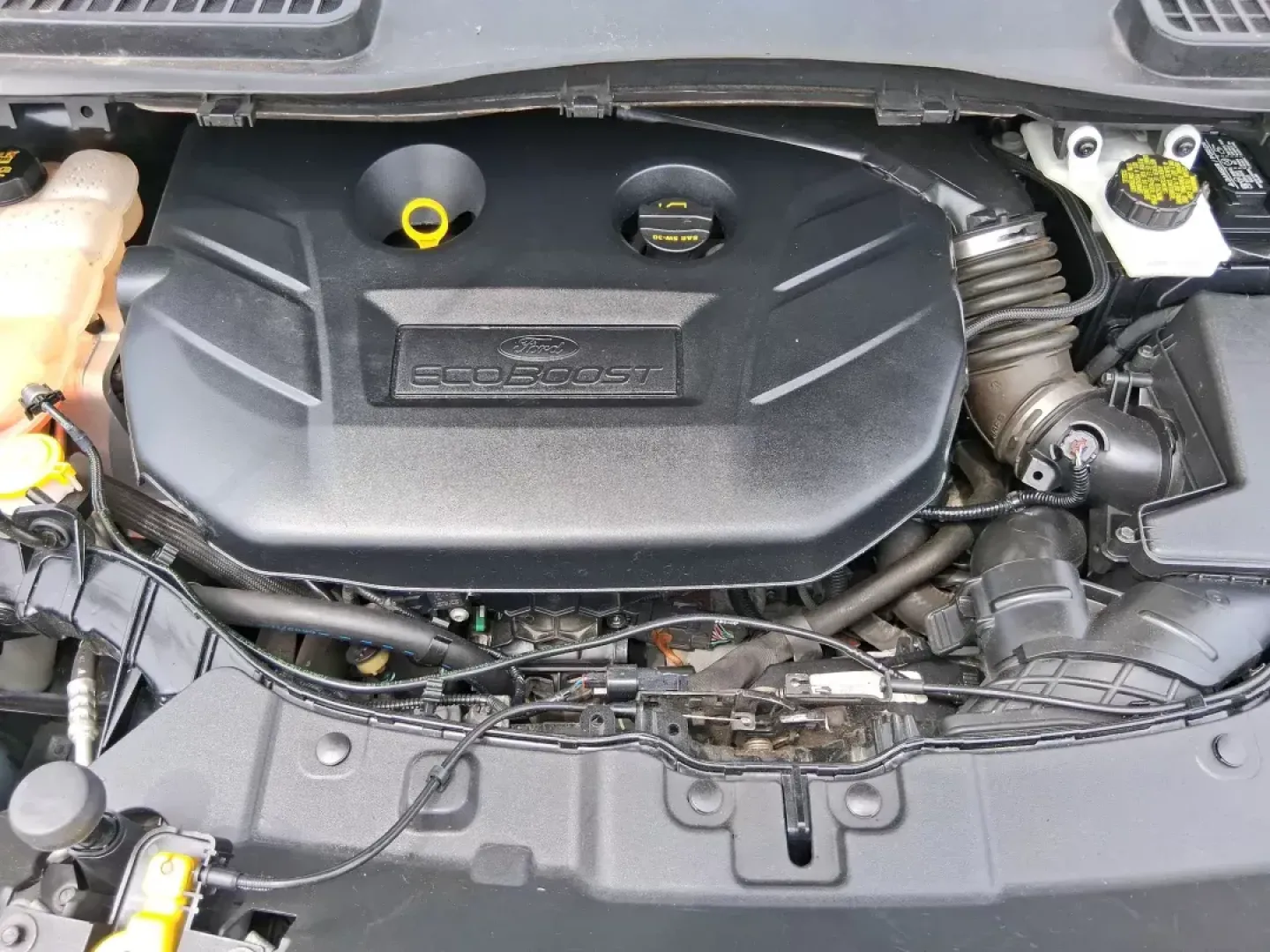 2014 Ford Escape Titanium (1FMCU9J96EU) with an EcoBoost 1.6L I-4 gasoline direct injection engine, located at 4508 South Dixie Dr, Moraine, OH, 45439, (937) 908-9800, 39.689976, -84.218452 - **Unleash Adventure with the 2014 Ford Escape Titanium: Your Ideal Family SUV!**<br /> <br /> Are you ready to take on the open road for your next family getaway or weekend adventure? Look no further than the 2014 Ford Escape Titanium, a versatile SUV that combines style, comfort, and functionality, - Photo#10
