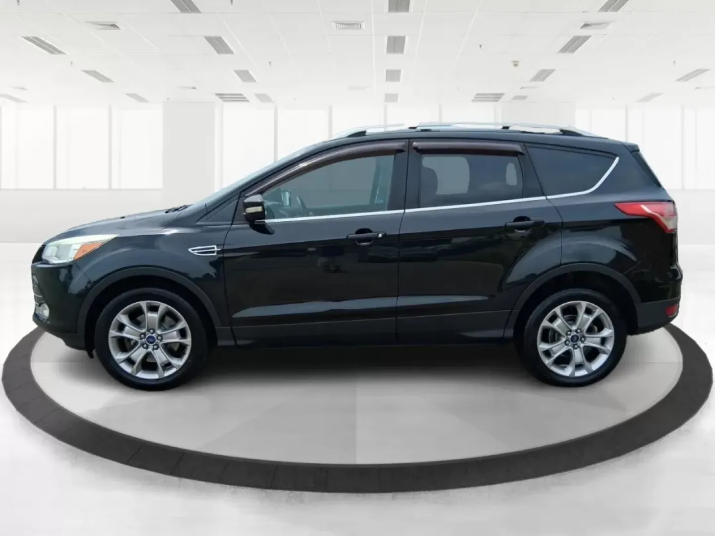 2014 Ford Escape Titanium (1FMCU9J96EU) with an EcoBoost 1.6L I-4 gasoline direct injection engine, located at 4508 South Dixie Dr, Moraine, OH, 45439, (937) 908-9800, 39.689976, -84.218452 - **Unleash Adventure with the 2014 Ford Escape Titanium: Your Ideal Family SUV!**<br /> <br /> Are you ready to take on the open road for your next family getaway or weekend adventure? Look no further than the 2014 Ford Escape Titanium, a versatile SUV that combines style, comfort, and functionality, - Photo#5