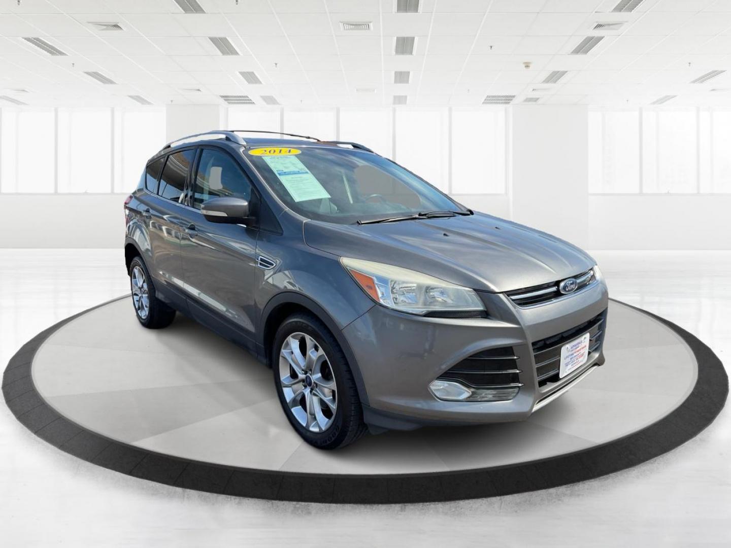 2014 Ford Escape Titanium (1FMCU9J98EU) with an Other engine, located at 1099 N County Rd 25A, Troy, OH, 45373, (937) 908-9800, 40.057079, -84.212883 - 2014 Ford Escape Titanium - Photo#0
