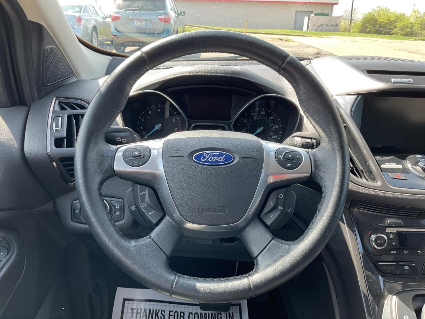 2014 Ford Escape Titanium (1FMCU9J98EU) with an Other engine, located at 1099 N County Rd 25A, Troy, OH, 45373, (937) 908-9800, 40.057079, -84.212883 - 2014 Ford Escape Titanium - Photo#14