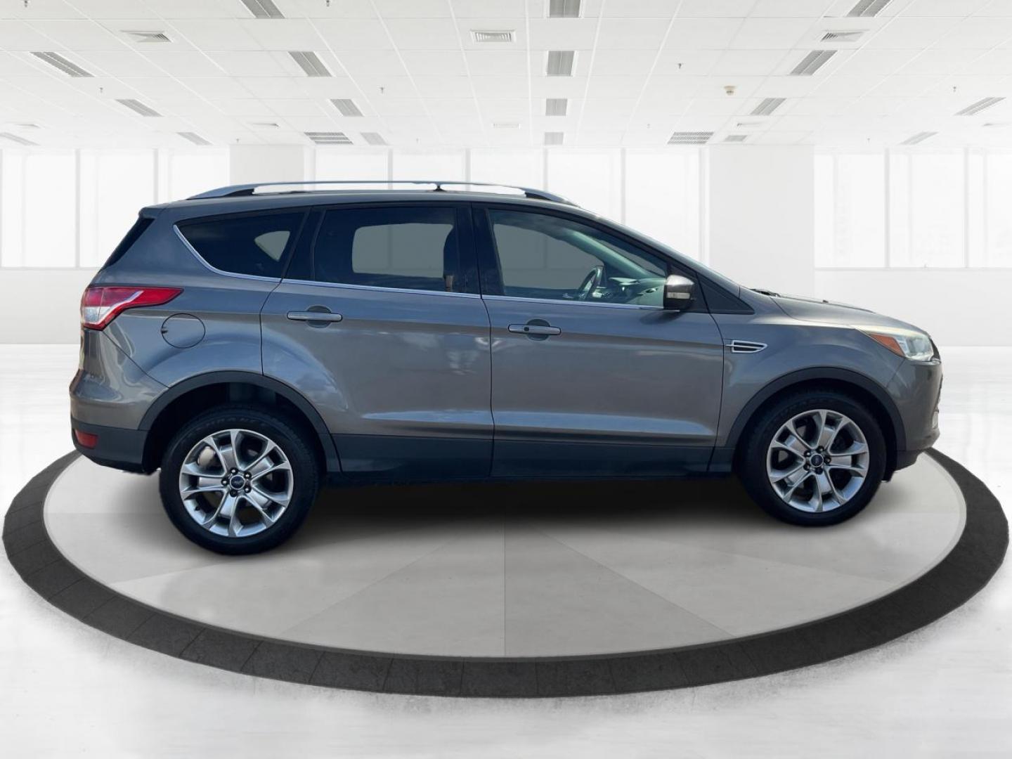 2014 Ford Escape Titanium (1FMCU9J98EU) with an Other engine, located at 1099 N County Rd 25A, Troy, OH, 45373, (937) 908-9800, 40.057079, -84.212883 - 2014 Ford Escape Titanium - Photo#1