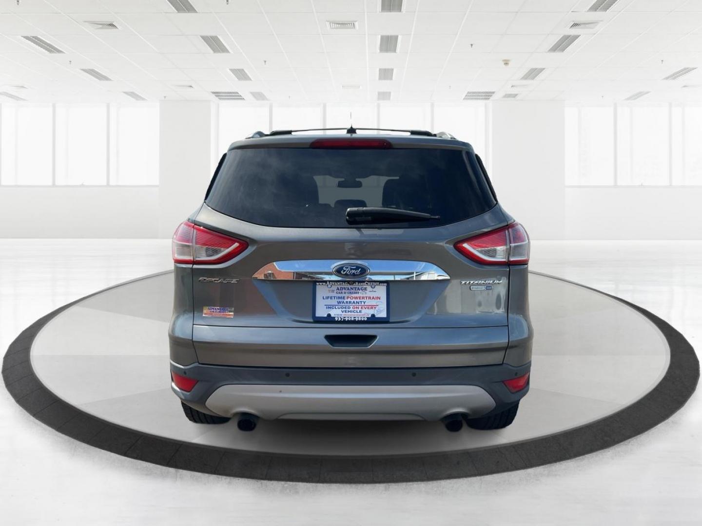 2014 Ford Escape Titanium (1FMCU9J98EU) with an Other engine, located at 1099 N County Rd 25A, Troy, OH, 45373, (937) 908-9800, 40.057079, -84.212883 - 2014 Ford Escape Titanium - Photo#2