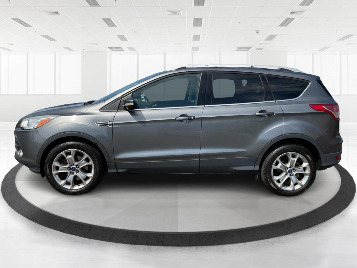 2014 Ford Escape Titanium (1FMCU9J98EU) with an Other engine, located at 1099 N County Rd 25A, Troy, OH, 45373, (937) 908-9800, 40.057079, -84.212883 - 2014 Ford Escape Titanium - Photo#4