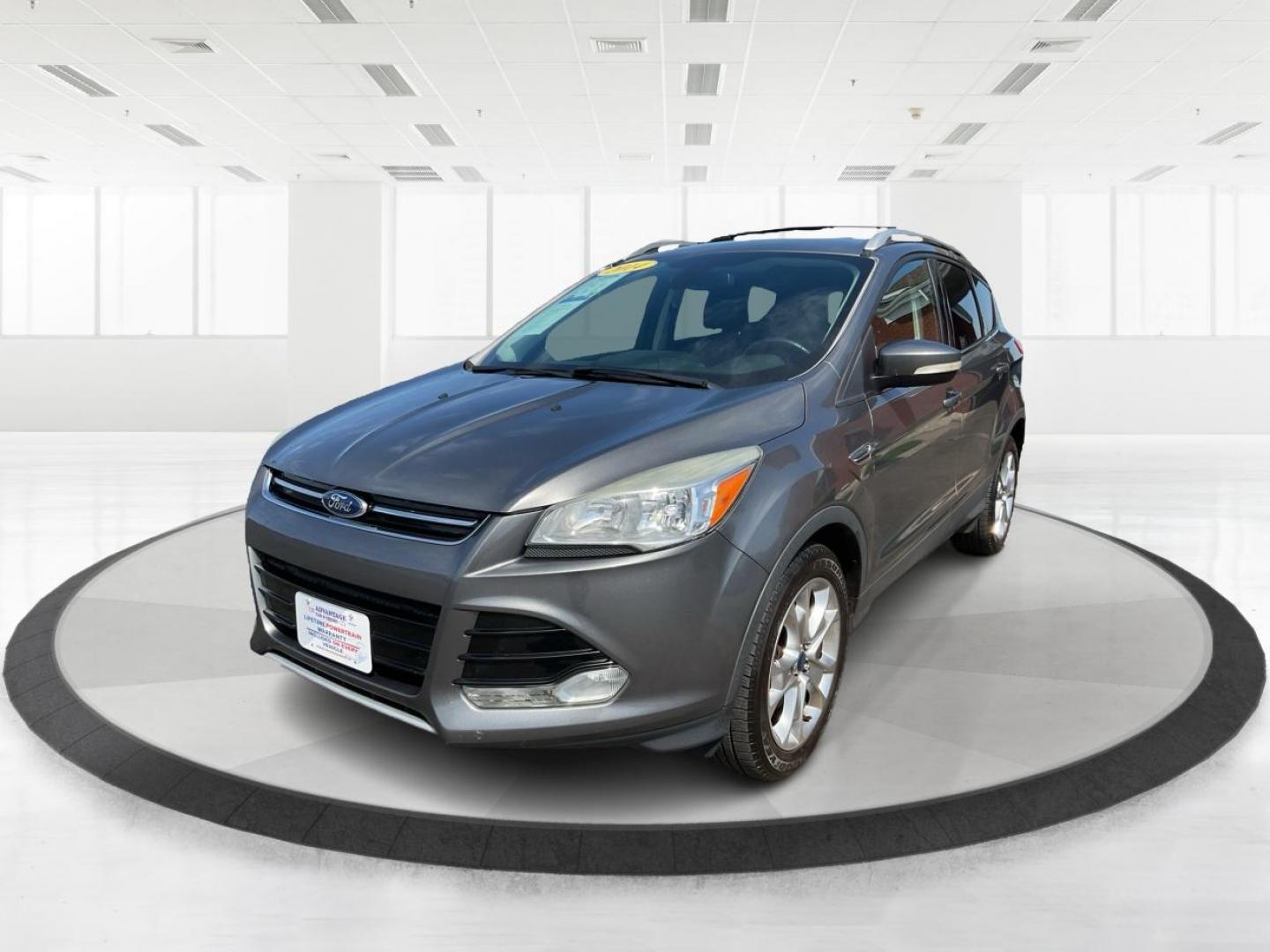 2014 Ford Escape Titanium (1FMCU9J98EU) with an Other engine, located at 1099 N County Rd 25A, Troy, OH, 45373, (937) 908-9800, 40.057079, -84.212883 - 2014 Ford Escape Titanium - Photo#6