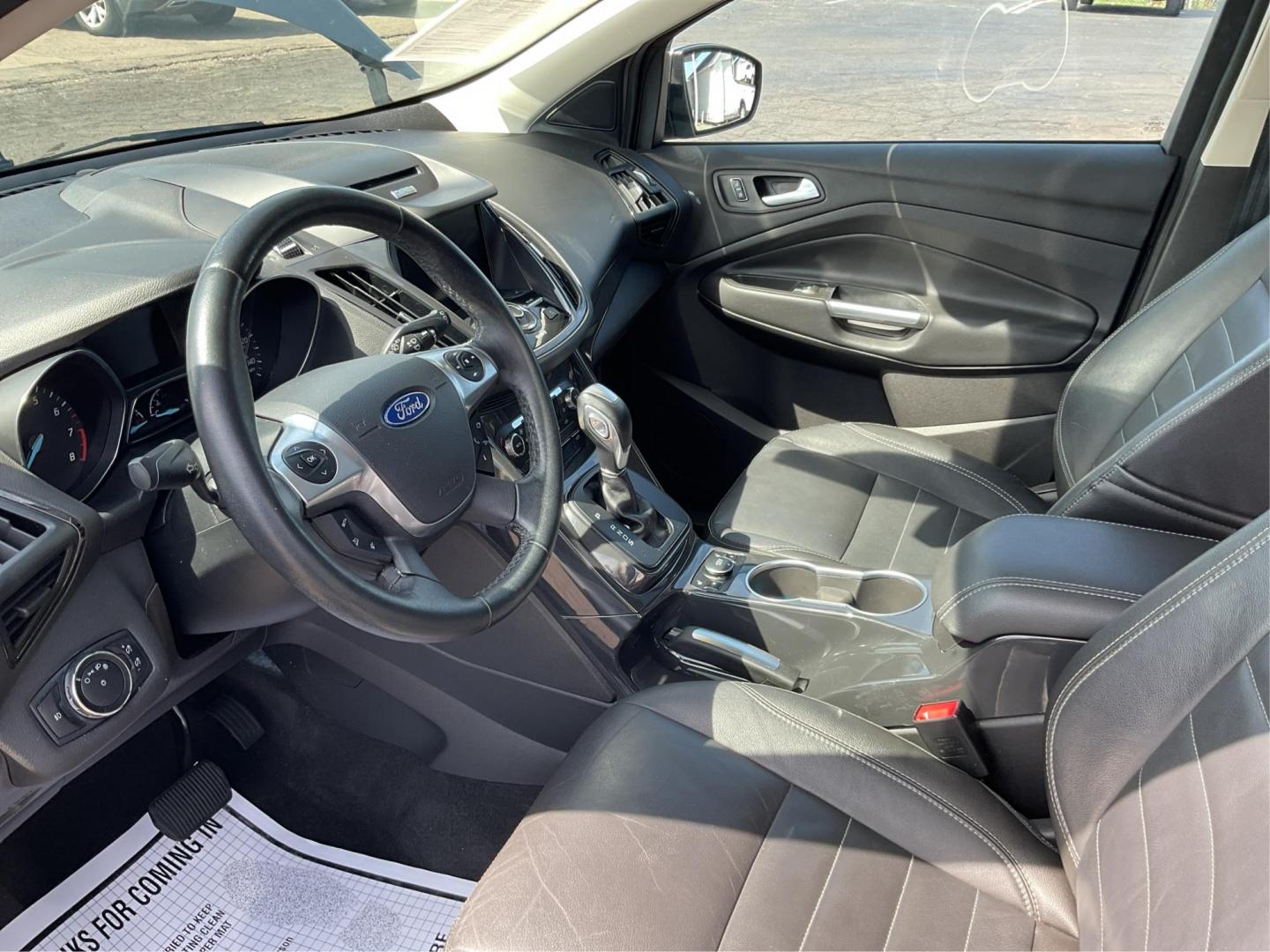 2014 Ford Escape Titanium (1FMCU9J98EU) with an Other engine, located at 1099 N County Rd 25A, Troy, OH, 45373, (937) 908-9800, 40.057079, -84.212883 - 2014 Ford Escape Titanium - Photo#7