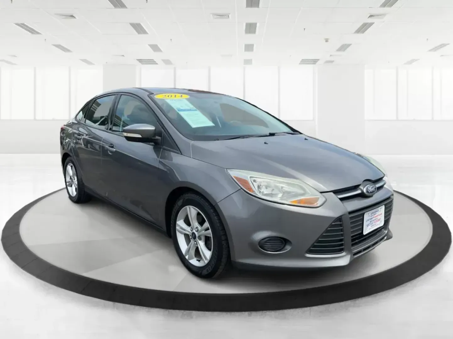 2014 Ford Focus SE (1FADP3F21EL) with an 2L I-4 gasoline direct injection engine, located at 1099 N County Rd 25A, Troy, OH, 45373, (937) 908-9800, 40.057079, -84.212883 - 2014 Ford Focus SE - Photo#0