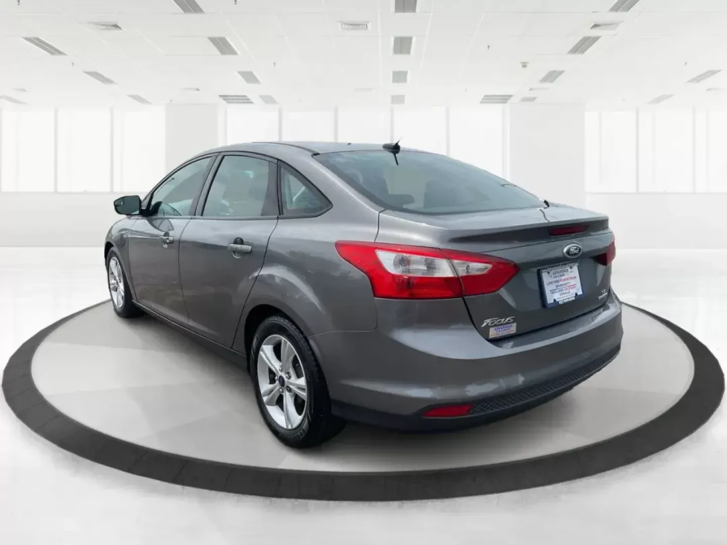 2014 Ford Focus SE (1FADP3F21EL) with an 2L I-4 gasoline direct injection engine, located at 1099 N County Rd 25A, Troy, OH, 45373, (937) 908-9800, 40.057079, -84.212883 - 2014 Ford Focus SE - Photo#4