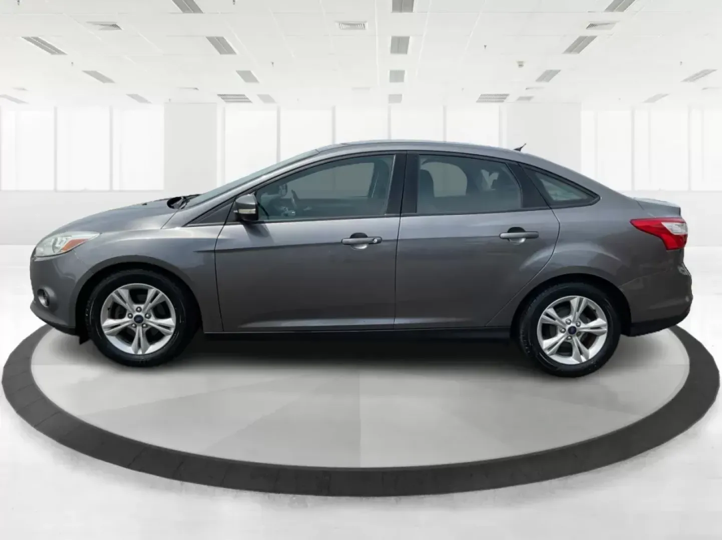 2014 Ford Focus SE (1FADP3F21EL) with an 2L I-4 gasoline direct injection engine, located at 1099 N County Rd 25A, Troy, OH, 45373, (937) 908-9800, 40.057079, -84.212883 - 2014 Ford Focus SE - Photo#5