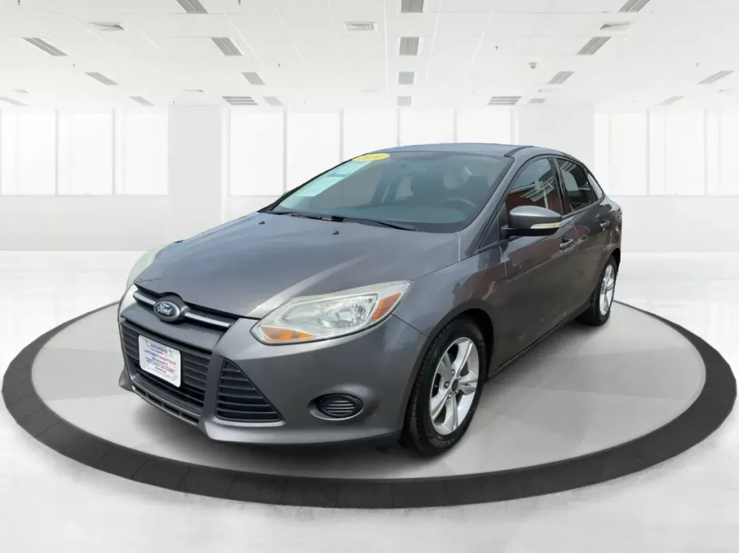 2014 Ford Focus SE (1FADP3F21EL) with an 2L I-4 gasoline direct injection engine, located at 1099 N County Rd 25A, Troy, OH, 45373, (937) 908-9800, 40.057079, -84.212883 - 2014 Ford Focus SE - Photo#7