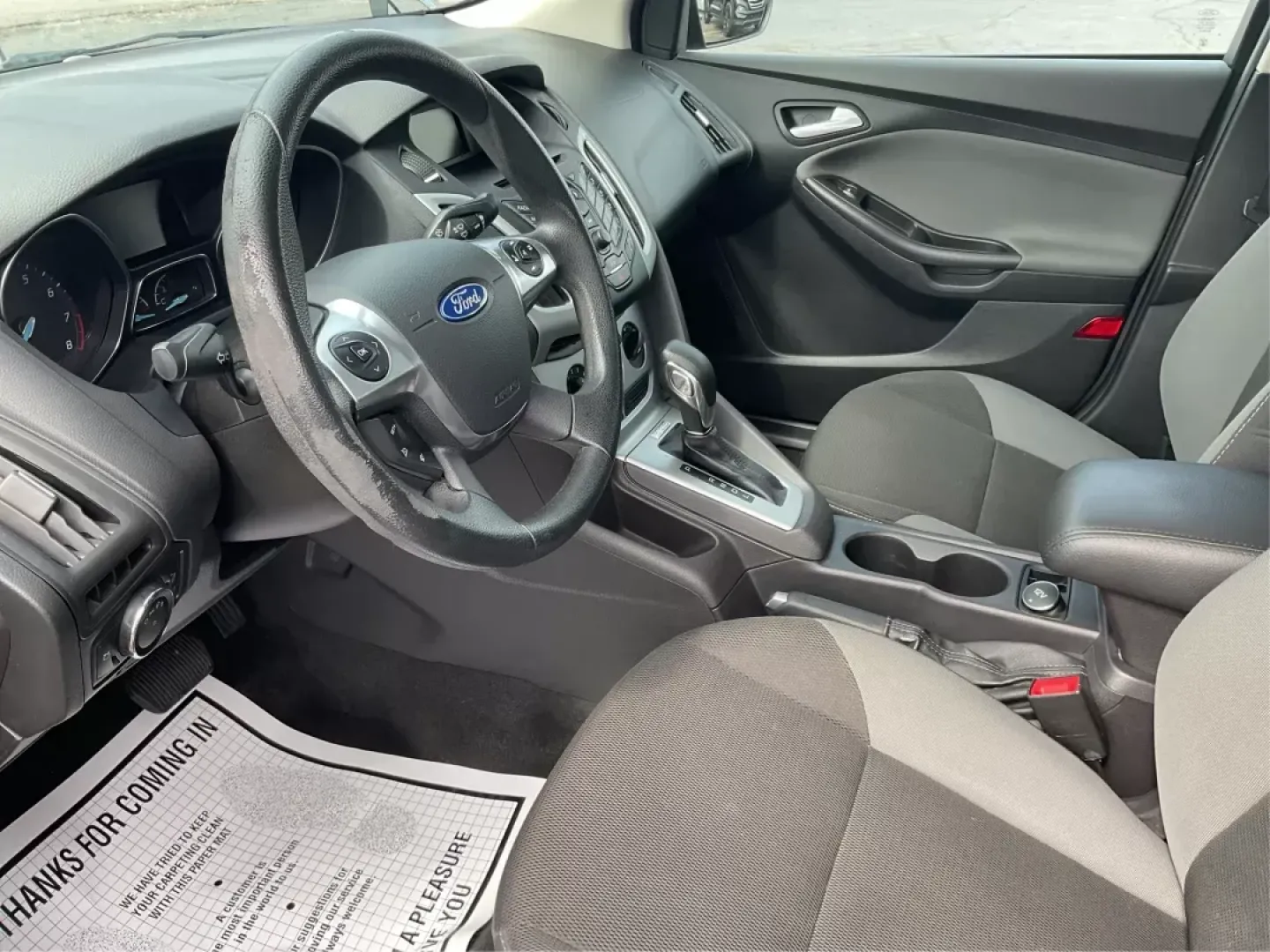 2014 Ford Focus SE (1FADP3F21EL) with an 2L I-4 gasoline direct injection engine, located at 1099 N County Rd 25A, Troy, OH, 45373, (937) 908-9800, 40.057079, -84.212883 - 2014 Ford Focus SE - Photo#8