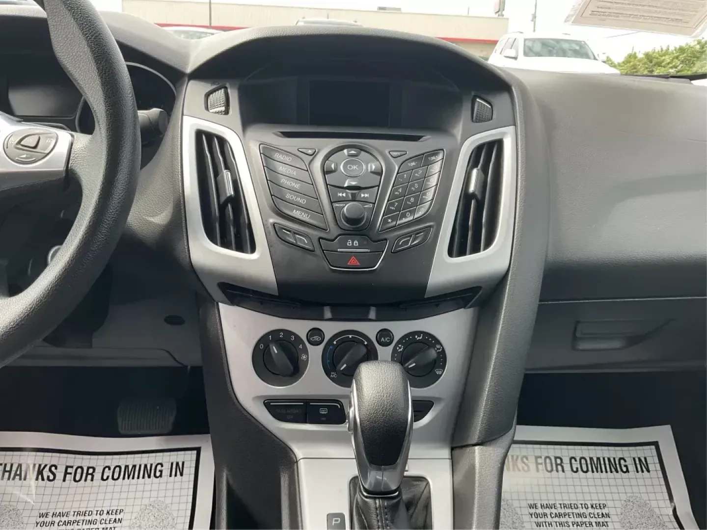 2014 Ford Focus SE (1FADP3F21EL) with an 2L I-4 gasoline direct injection engine, located at 1099 N County Rd 25A, Troy, OH, 45373, (937) 908-9800, 40.057079, -84.212883 - 2014 Ford Focus SE - Photo#12