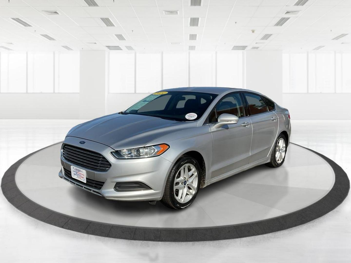 2014 Ingot Silver Ford Fusion SE (1FA6P0H76E5) with an 2.5L L4 DOHC 16V engine, located at 4508 South Dixie Dr, Moraine, OH, 45439, (937) 908-9800, 39.689976, -84.218452 - 2014 Ford Fusion SE - Photo#7
