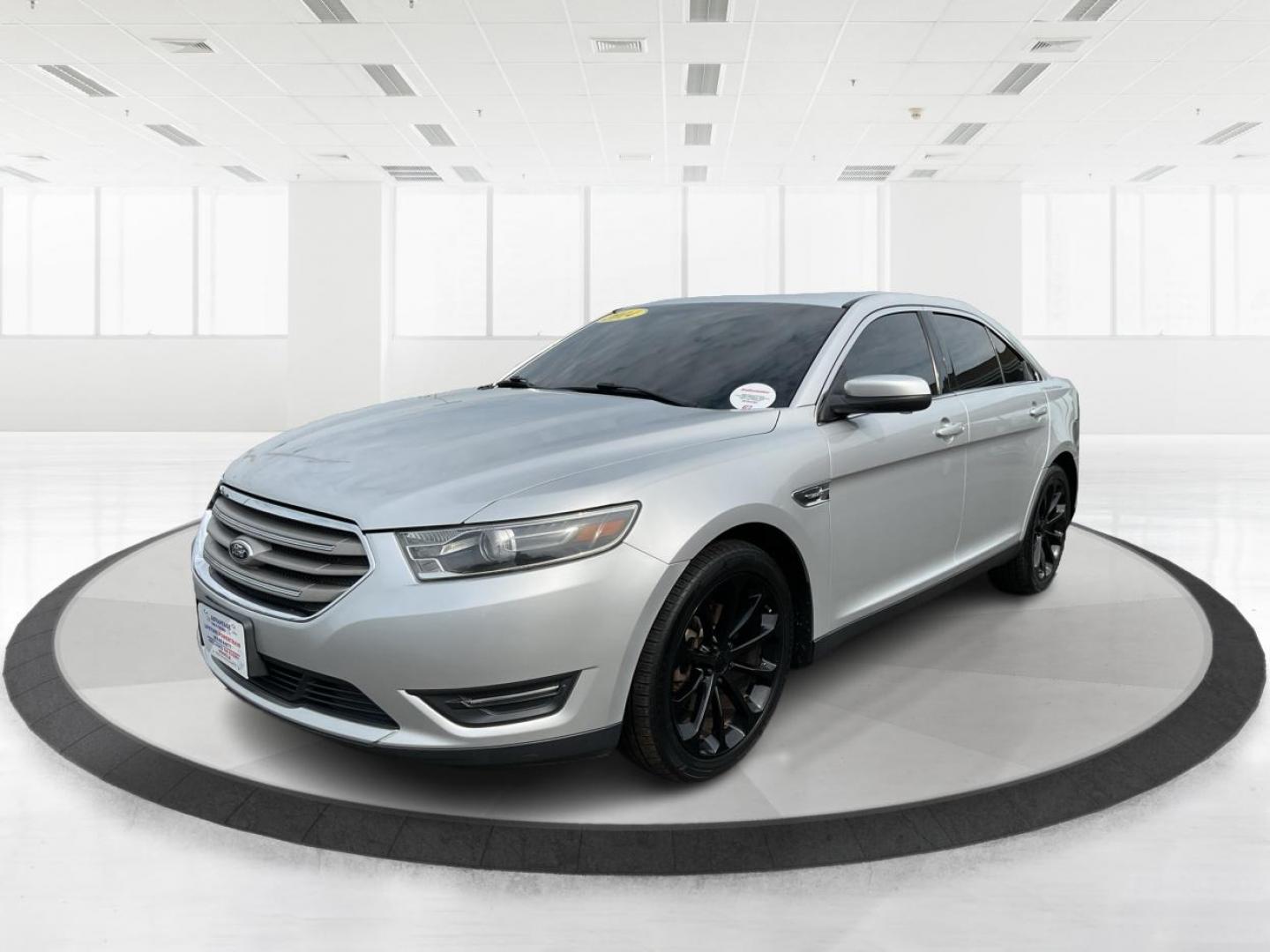 2014 Ford Taurus SEL (1FAHP2E86EG) with an EcoBoost 2L I-4 gasoline direct injection engine, located at 1099 N County Rd 25A, Troy, OH, 45373, (937) 908-9800, 40.057079, -84.212883 - 2014 Ford Taurus SEL - Photo#8