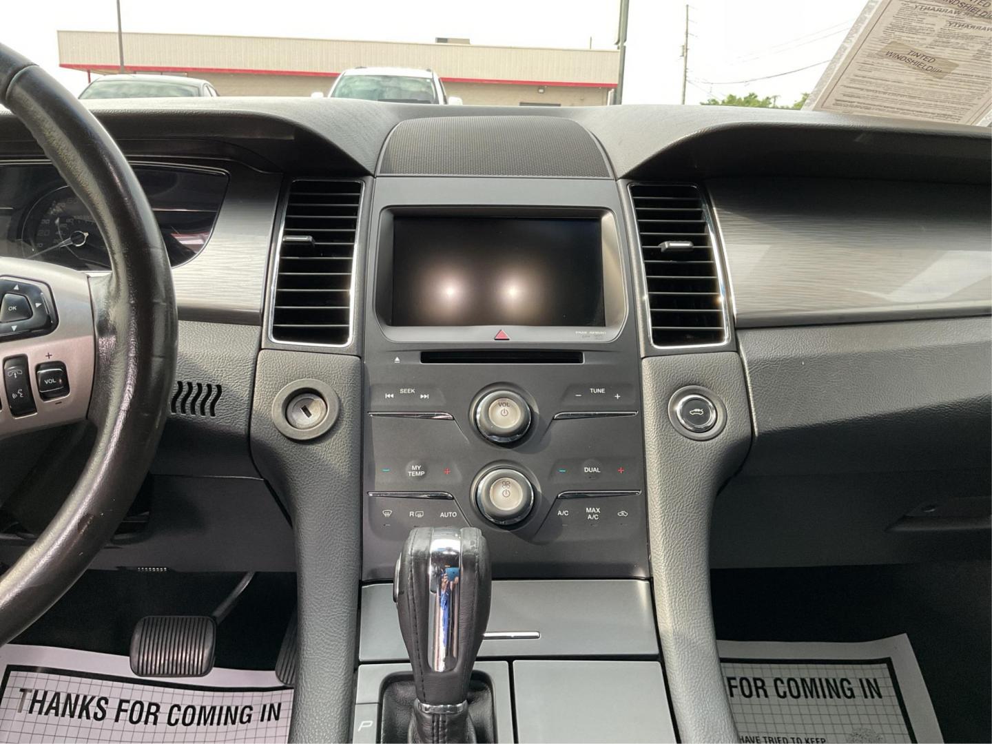 2014 Ford Taurus SEL (1FAHP2E86EG) with an EcoBoost 2L I-4 gasoline direct injection engine, located at 1099 N County Rd 25A, Troy, OH, 45373, (937) 908-9800, 40.057079, -84.212883 - 2014 Ford Taurus SEL - Photo#13