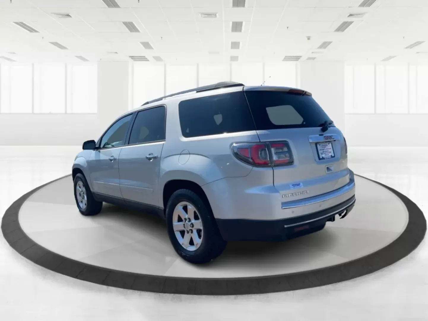 2014 GMC Acadia SLE-2 AWD (1GKKVPKD1EJ) with an 3.6L V6 DOHC 24V engine, 6-Speed Automatic transmission, located at 1099 N County Rd 25A, Troy, OH, 45373, (937) 908-9800, 40.057079, -84.212883 - If you're searching for the perfect family SUV that balances style, comfort, and an adventurous spirit, look no further than this stunning 2014 GMC Acadia SLE-2 AWD, now available at Advantage Car and Credit in Fairborn, OH. With spacious seating for up to eight passengers and the versatility needed - Photo#4