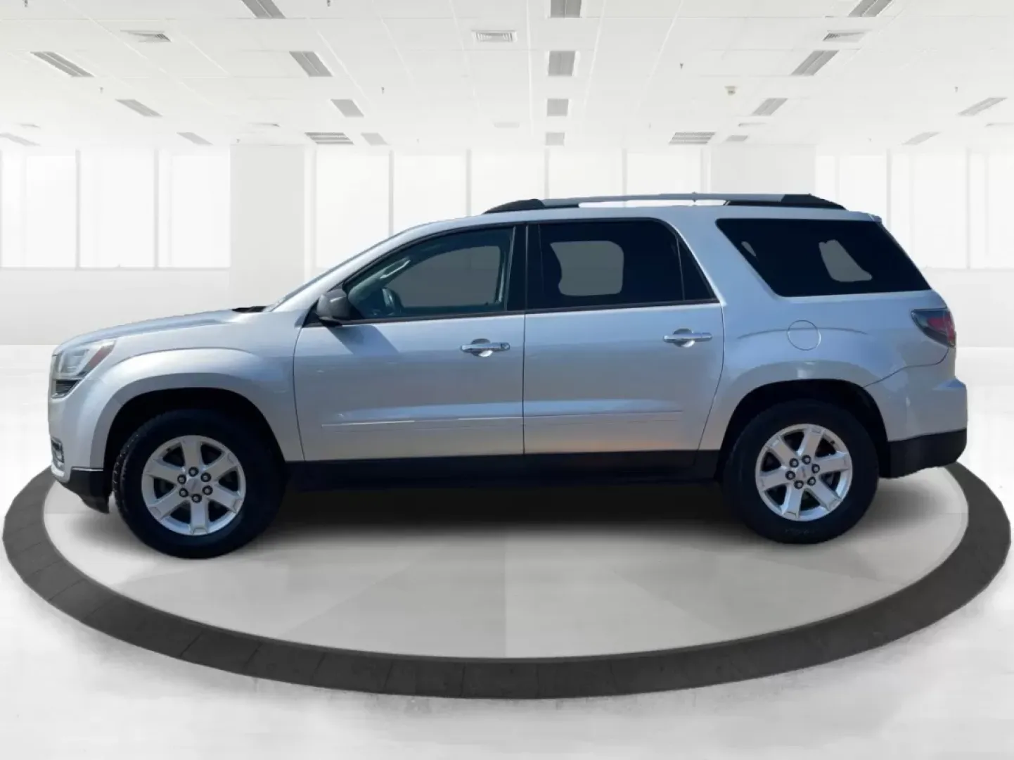 2014 GMC Acadia SLE-2 AWD (1GKKVPKD1EJ) with an 3.6L V6 DOHC 24V engine, 6-Speed Automatic transmission, located at 1099 N County Rd 25A, Troy, OH, 45373, (937) 908-9800, 40.057079, -84.212883 - If you're searching for the perfect family SUV that balances style, comfort, and an adventurous spirit, look no further than this stunning 2014 GMC Acadia SLE-2 AWD, now available at Advantage Car and Credit in Fairborn, OH. With spacious seating for up to eight passengers and the versatility needed - Photo#5