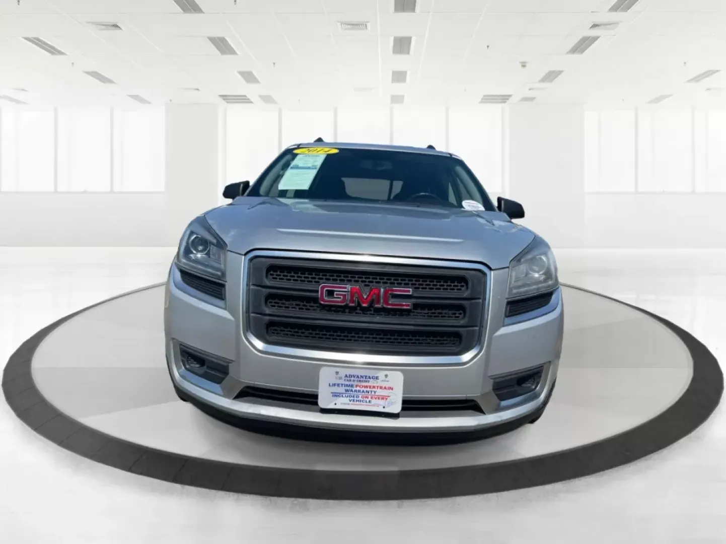 2014 GMC Acadia SLE-2 AWD (1GKKVPKD1EJ) with an 3.6L V6 DOHC 24V engine, 6-Speed Automatic transmission, located at 1099 N County Rd 25A, Troy, OH, 45373, (937) 908-9800, 40.057079, -84.212883 - If you're searching for the perfect family SUV that balances style, comfort, and an adventurous spirit, look no further than this stunning 2014 GMC Acadia SLE-2 AWD, now available at Advantage Car and Credit in Fairborn, OH. With spacious seating for up to eight passengers and the versatility needed - Photo#6
