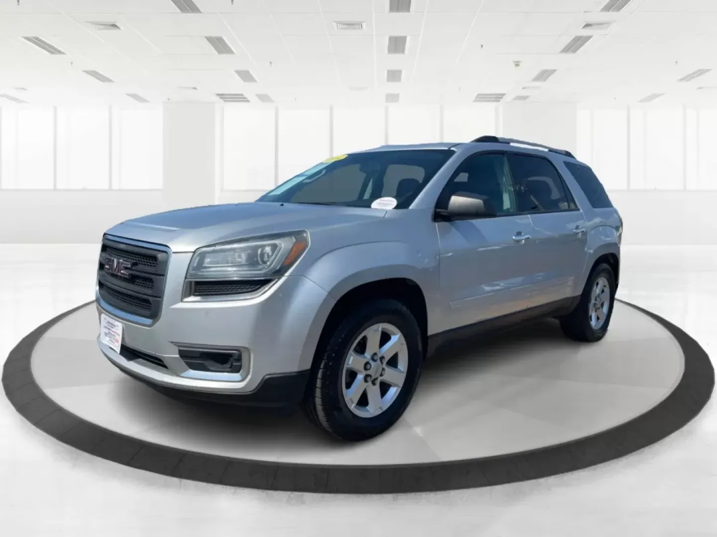 2014 GMC Acadia SLE-2 AWD (1GKKVPKD1EJ) with an 3.6L V6 DOHC 24V engine, 6-Speed Automatic transmission, located at 1099 N County Rd 25A, Troy, OH, 45373, (937) 908-9800, 40.057079, -84.212883 - If you're searching for the perfect family SUV that balances style, comfort, and an adventurous spirit, look no further than this stunning 2014 GMC Acadia SLE-2 AWD, now available at Advantage Car and Credit in Fairborn, OH. With spacious seating for up to eight passengers and the versatility needed - Photo#7