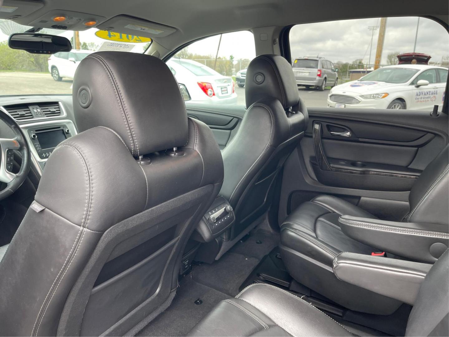 2014 GMC Acadia SLT-1 (1GKKVRKD2EJ) with an 3.6L V-6 gasoline direct injection engine, located at 1099 N County Rd 25A, Troy, OH, 45373, (937) 908-9800, 40.057079, -84.212883 - Third Row - Photo#9