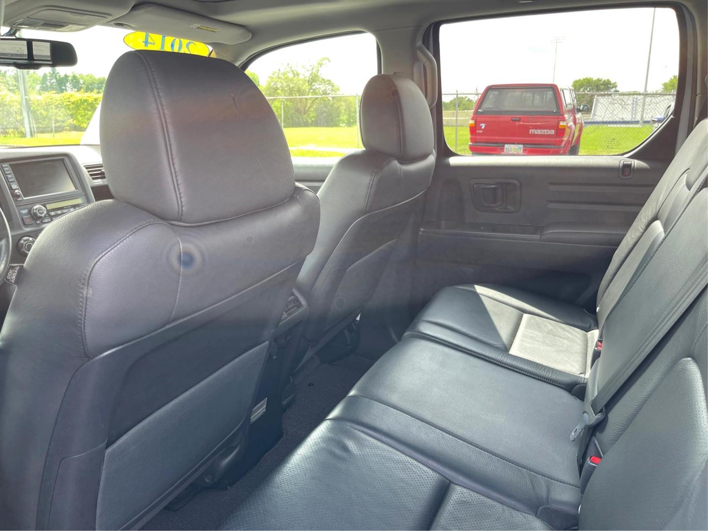 2014 Honda Ridgeline RTL-S (5FPYK1F67EB) with an 3.5L V6 SOHC 24V engine, 5-Speed Automatic transmission, located at 1230 East Main St, Xenia, OH, 45385, (937) 908-9800, 39.688026, -83.910172 - One Owner - Photo#9