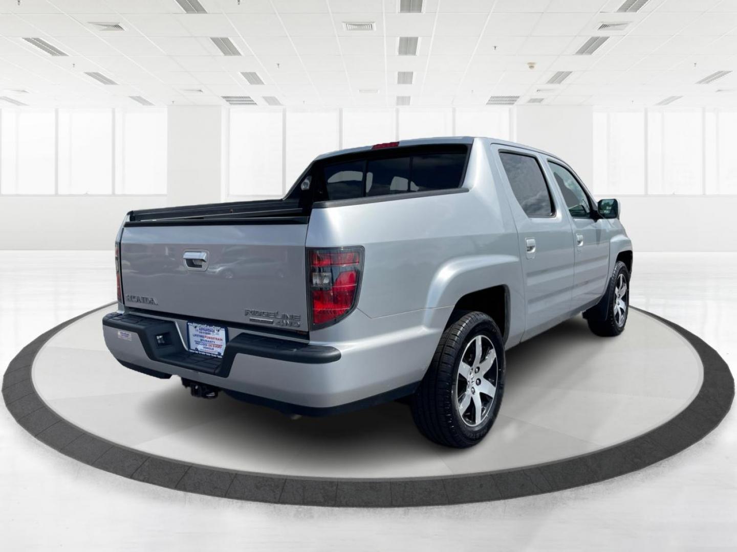 2014 Honda Ridgeline RTL-S (5FPYK1F67EB) with an 3.5L V6 SOHC 24V engine, 5-Speed Automatic transmission, located at 1230 East Main St, Xenia, OH, 45385, (937) 908-9800, 39.688026, -83.910172 - One Owner - Photo#2