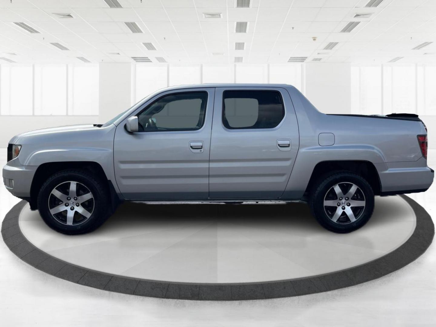2014 Honda Ridgeline RTL-S (5FPYK1F67EB) with an 3.5L V6 SOHC 24V engine, 5-Speed Automatic transmission, located at 1230 East Main St, Xenia, OH, 45385, (937) 908-9800, 39.688026, -83.910172 - One Owner - Photo#5