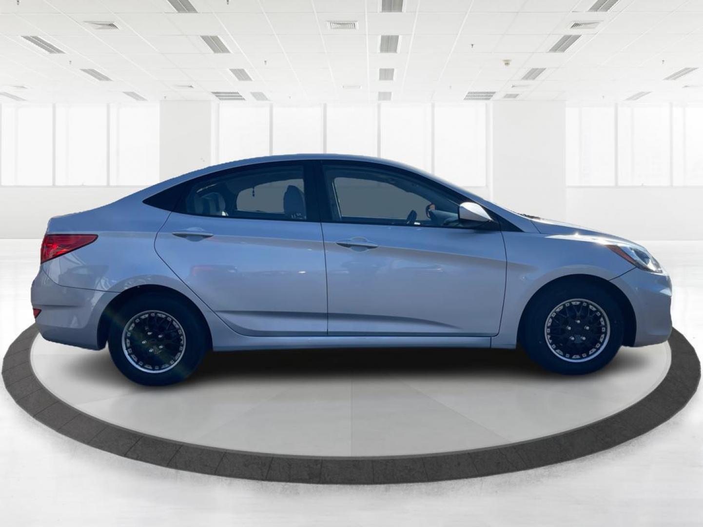 2014 Hyundai Accent GLS 4-Door (KMHCT4AE0EU) with an 1.6L L4 DOHC 16V engine, located at 8750 N County Rd 25A, Piqua, OH, 45356, (937) 908-9800, 40.164391, -84.232513 - 2014 Hyundai Accent GLS 4-Door - Photo#1