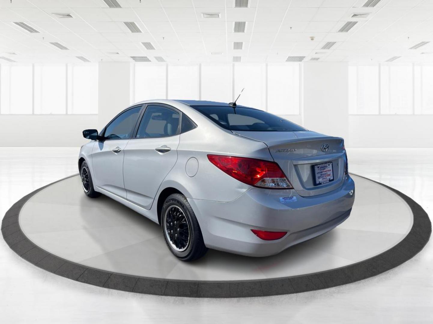 2014 Hyundai Accent GLS 4-Door (KMHCT4AE0EU) with an 1.6L L4 DOHC 16V engine, located at 8750 N County Rd 25A, Piqua, OH, 45356, (937) 908-9800, 40.164391, -84.232513 - 2014 Hyundai Accent GLS 4-Door - Photo#4