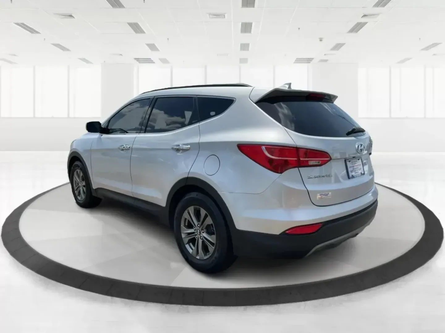 2014 Moonstone Silver Hyundai Santa Fe Sport 2.4 AWD (5XYZUDLB6EG) with an 2.4L L4 DOHC 16V engine, 6-Speed Automatic transmission, located at 8750 N County Rd 25A, Piqua, OH, 45356, (937) 908-9800, 40.164391, -84.232513 - **Adventure Awaits with the 2014 Hyundai Santa Fe Sport 2.4 AWD: Your Perfect Family Companion!** <br /> <br /> Are you searching for a vehicle that seamlessly blends versatility and reliability, ideal for everything from family road trips to daily commutes? Look no further! Advantage Car and Credit - Photo#4