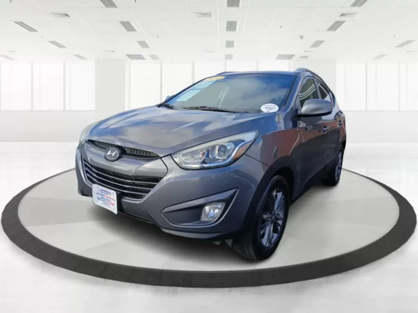 2014 Hyundai Tucson GLS AWD (KM8JUCAG3EU) with an 2.4L L4 DOHC 16V engine, 6-Speed Automatic transmission, located at 1184 Kauffman Ave, Fairborn, OH, 45324, (937) 908-9800, 39.807072, -84.030914 - **Explore the Great Outdoors with the 2014 Hyundai Tucson GLS AWD! Perfect for Weekend Adventures!**<br /> <br /> If you're ready to embrace life's adventures, the 2014 Hyundai Tucson GLS AWD is the SUV you need. Whether you're planning a weekend camping trip, daily commutes around Fairborn, or shut - Photo#7