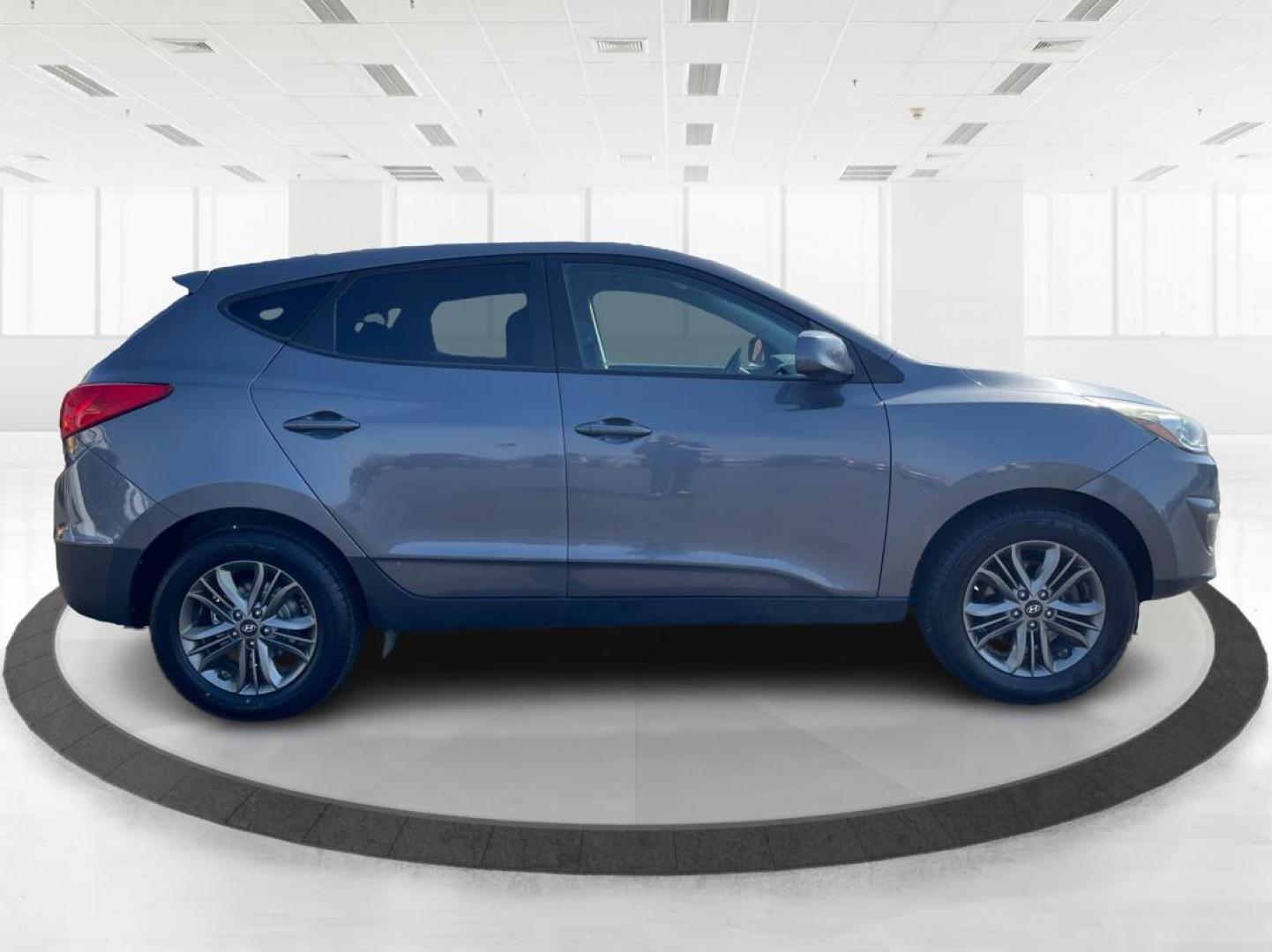 2014 Hyundai Tucson GLS (KM8JTCAF5EU) with an Nu 2L I-4 gasoline direct injection engine, located at 4508 South Dixie Dr, Moraine, OH, 45439, (937) 908-9800, 39.689976, -84.218452 - 2014 Hyundai Tucson GLS - Photo#1