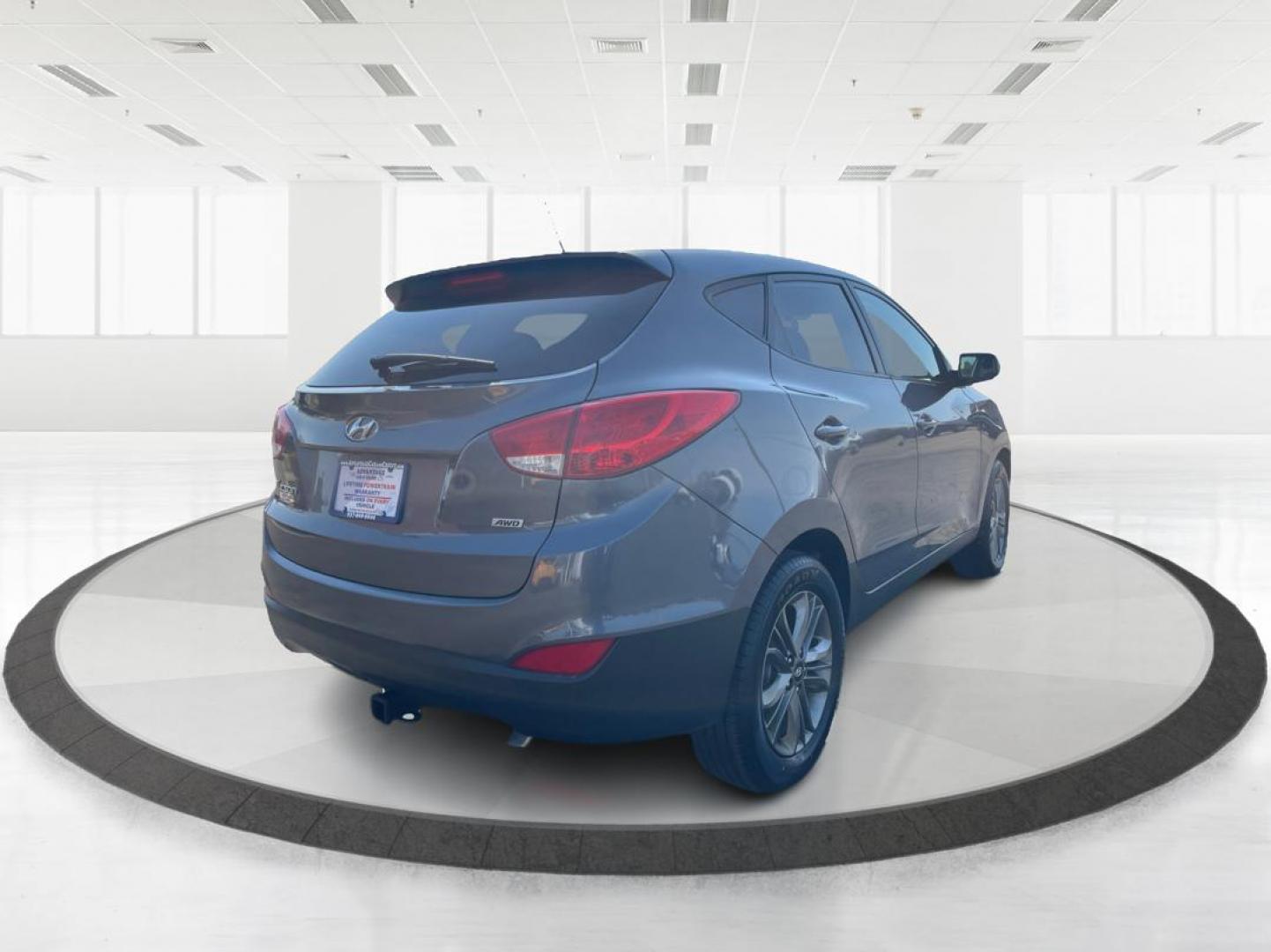 2014 Hyundai Tucson GLS (KM8JTCAF5EU) with an Nu 2L I-4 gasoline direct injection engine, located at 4508 South Dixie Dr, Moraine, OH, 45439, (937) 908-9800, 39.689976, -84.218452 - 2014 Hyundai Tucson GLS - Photo#2