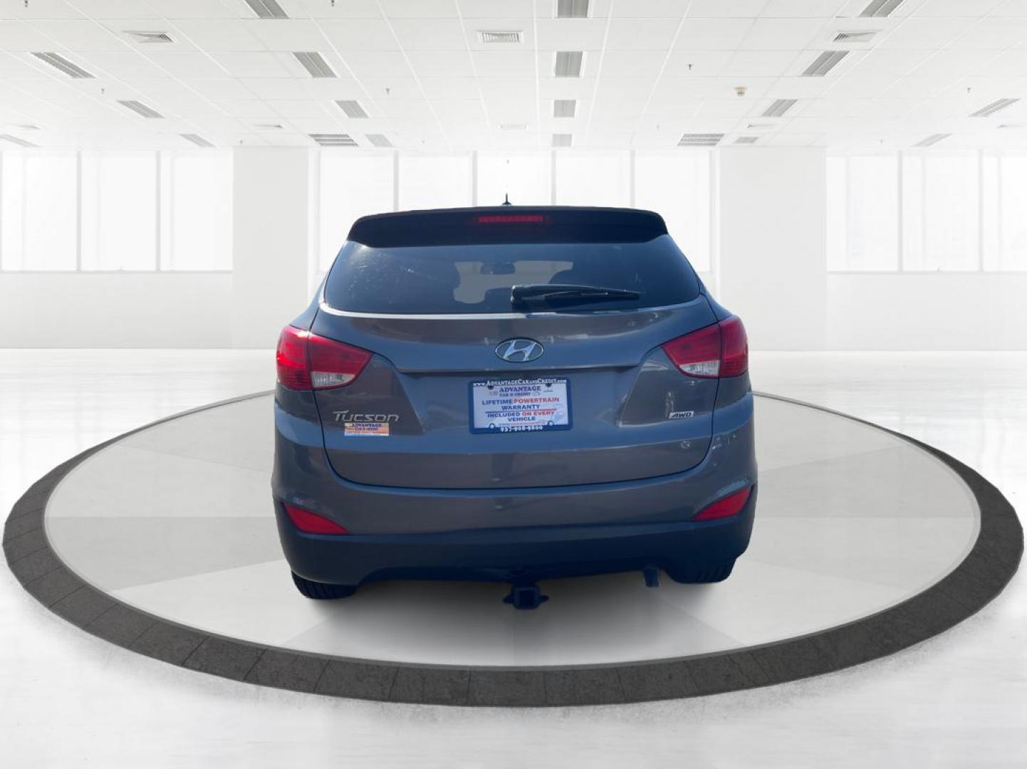 2014 Hyundai Tucson GLS (KM8JTCAF5EU) with an Nu 2L I-4 gasoline direct injection engine, located at 4508 South Dixie Dr, Moraine, OH, 45439, (937) 908-9800, 39.689976, -84.218452 - 2014 Hyundai Tucson GLS - Photo#3