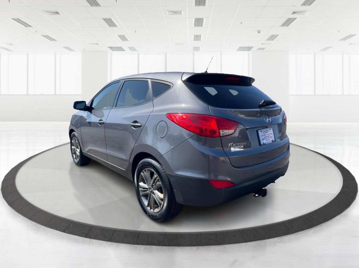 2014 Hyundai Tucson GLS (KM8JTCAF5EU) with an Nu 2L I-4 gasoline direct injection engine, located at 4508 South Dixie Dr, Moraine, OH, 45439, (937) 908-9800, 39.689976, -84.218452 - 2014 Hyundai Tucson GLS - Photo#4