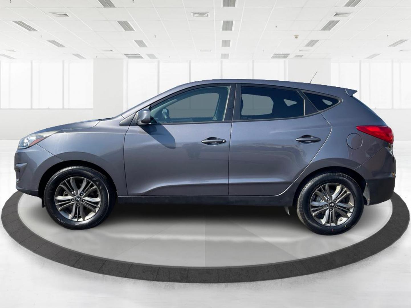 2014 Hyundai Tucson GLS (KM8JTCAF5EU) with an Nu 2L I-4 gasoline direct injection engine, located at 4508 South Dixie Dr, Moraine, OH, 45439, (937) 908-9800, 39.689976, -84.218452 - 2014 Hyundai Tucson GLS - Photo#5