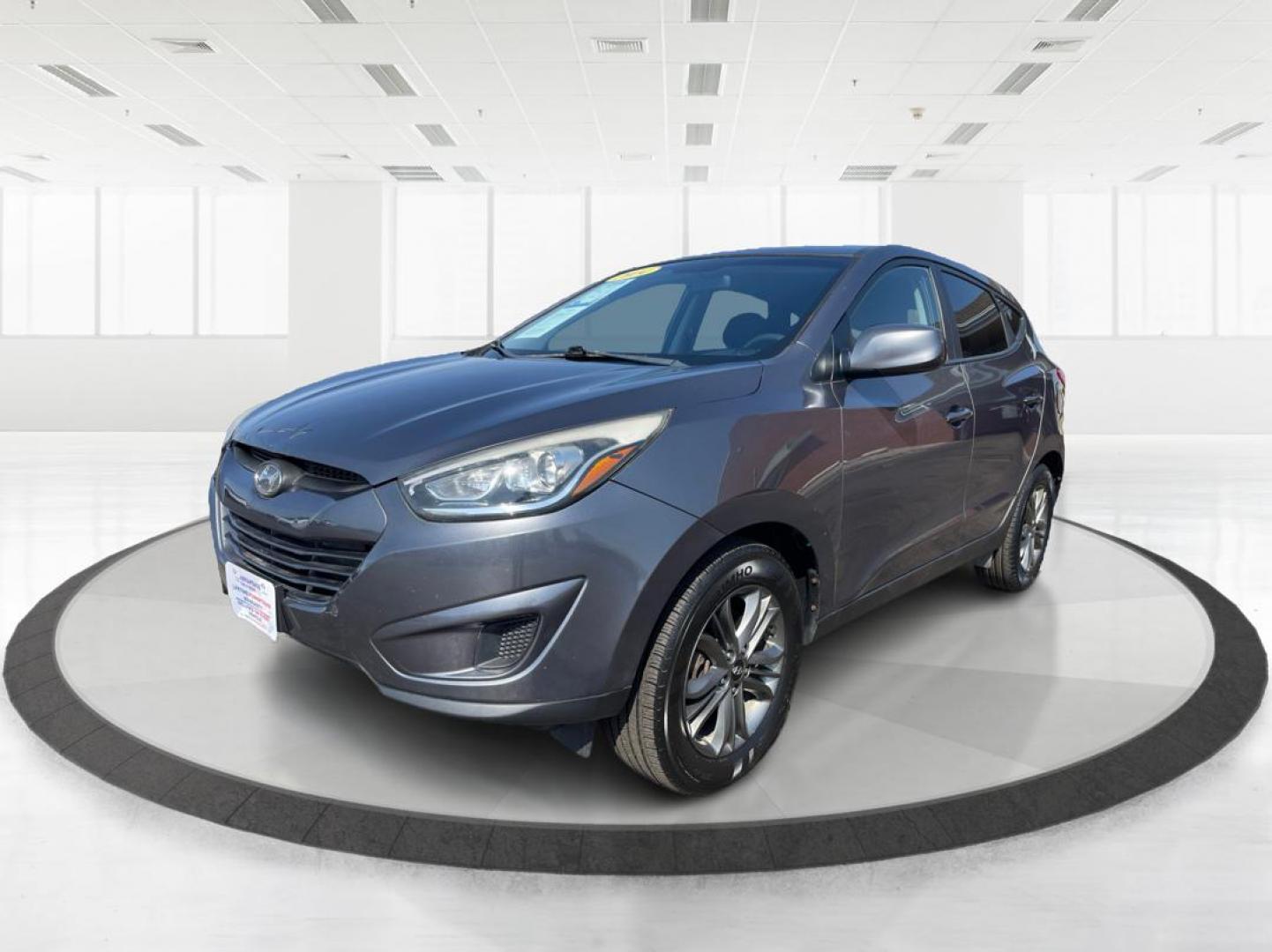 2014 Hyundai Tucson GLS (KM8JTCAF5EU) with an Nu 2L I-4 gasoline direct injection engine, located at 4508 South Dixie Dr, Moraine, OH, 45439, (937) 908-9800, 39.689976, -84.218452 - 2014 Hyundai Tucson GLS - Photo#7