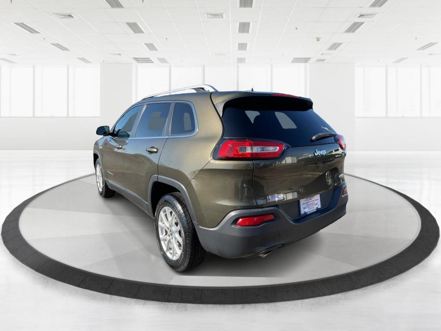 2014 Jeep Cherokee Latitude (1C4PJLCS8EW) with an MultiAir2 Tigershark 2.4L I-4 variable valve contr engine, located at 8750 N County Rd 25A, Piqua, OH, 45356, (937) 908-9800, 40.164391, -84.232513 - 2014 Jeep Cherokee Latitude - Photo#4