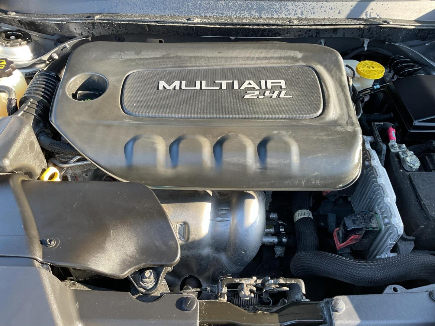 2014 Jeep Cherokee Sport (1C4PJLAB6EW) with an MultiAir2 Tigershark 2.4L I-4 variable valve contr engine, located at 880 E. National Road, Vandalia, OH, 45377, (937) 908-9800, 39.891918, -84.183594 - 2014 Jeep Cherokee Sport - Photo#10