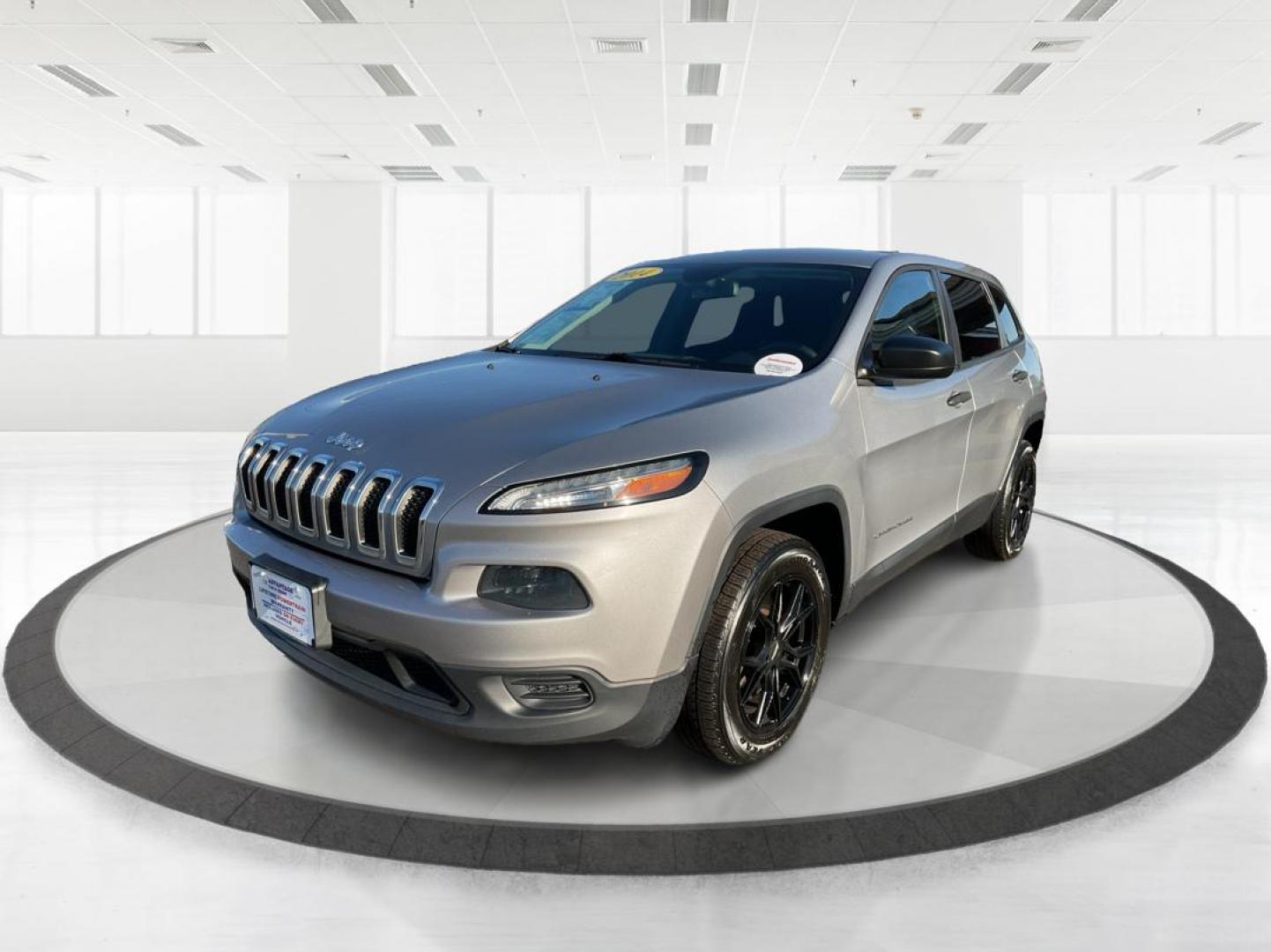 2014 Jeep Cherokee Sport (1C4PJLAB6EW) with an MultiAir2 Tigershark 2.4L I-4 variable valve contr engine, located at 880 E. National Road, Vandalia, OH, 45377, (937) 908-9800, 39.891918, -84.183594 - 2014 Jeep Cherokee Sport - Photo#7