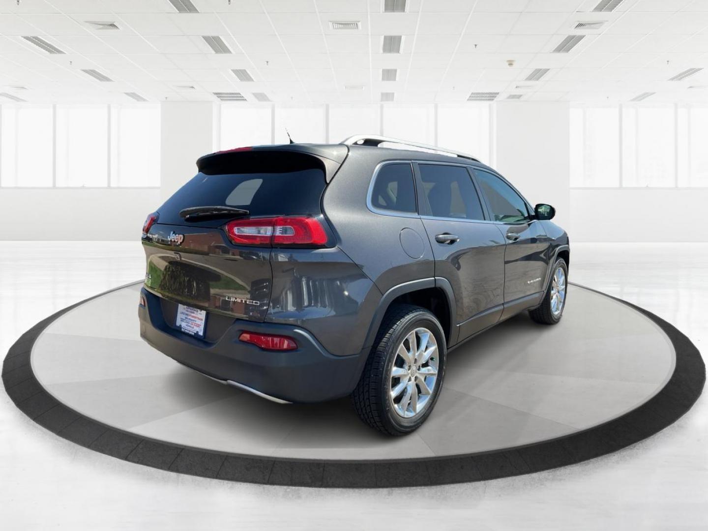 2014 Jeep Cherokee Limited 4WD (1C4PJMDBXEW) with an 2.4L L4 DOHC 16V engine, 9-Speed Automatic transmission, located at 880 E. National Road, Vandalia, OH, 45377, (937) 908-9800, 39.891918, -84.183594 - 2014 Jeep Cherokee Limited 4WD - Photo#2
