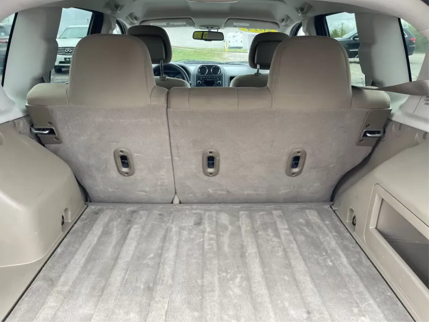 2014 Bright White Clearcoat Jeep Compass Sport FWD (1C4NJCBA9ED) with an 2.0L L4 DOHC 16V engine, located at 880 E. National Road, Vandalia, OH, 45377, (937) 908-9800, 39.891918, -84.183594 - 2014 Jeep Compass Sport FWD - Photo#10