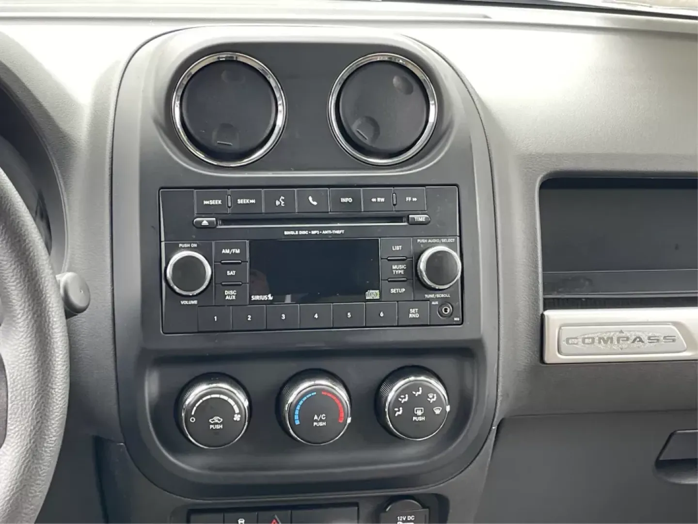 2014 Bright White Clearcoat Jeep Compass Sport FWD (1C4NJCBA9ED) with an 2.0L L4 DOHC 16V engine, located at 880 E. National Road, Vandalia, OH, 45377, (937) 908-9800, 39.891918, -84.183594 - 2014 Jeep Compass Sport FWD - Photo#11
