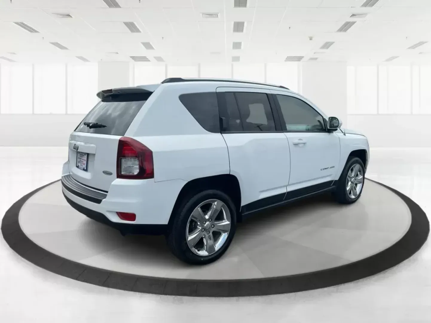2014 Jeep Compass Latitude (1C4NJDEB0ED) with an 2.4L I-4 DOHC engine, located at 8750 N County Rd 25A, Piqua, OH, 45356, (937) 908-9800, 40.164391, -84.232513 - **Adventure Awaits: Discover the 2014 Jeep Compass Latitude at Advantage Car and Credit in Fairborn, OH!**<br /> <br /> Are you ready to elevate your lifestyle and embrace new adventures? Whether you're planning a family getaway, commuting to work, or exploring the scenic roads of Fairborn, this exc - Photo#2