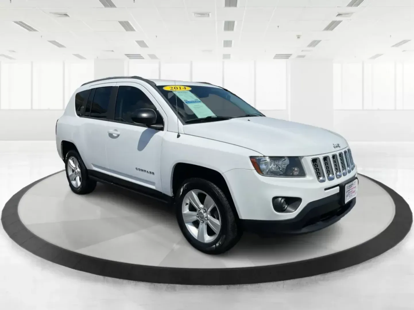 2014 Jeep Compass Sport (1C4NJDBB6ED) with an 2.4L I-4 DOHC engine, located at 401 Woodman Dr, Riverside, OH, 45431, (937) 908-9800, 39.760899, -84.123421 - **Discover Your Next Adventure with the 2014 Jeep Compass Sport at Advantage Car and Credit!**<br /> <br /> Are you ready to elevate your driving experience? Whether you're a weekend adventurer, a busy commuter, or a growing family seeking reliability, the 2014 Jeep Compass Sport is the perfect comp - Photo#0
