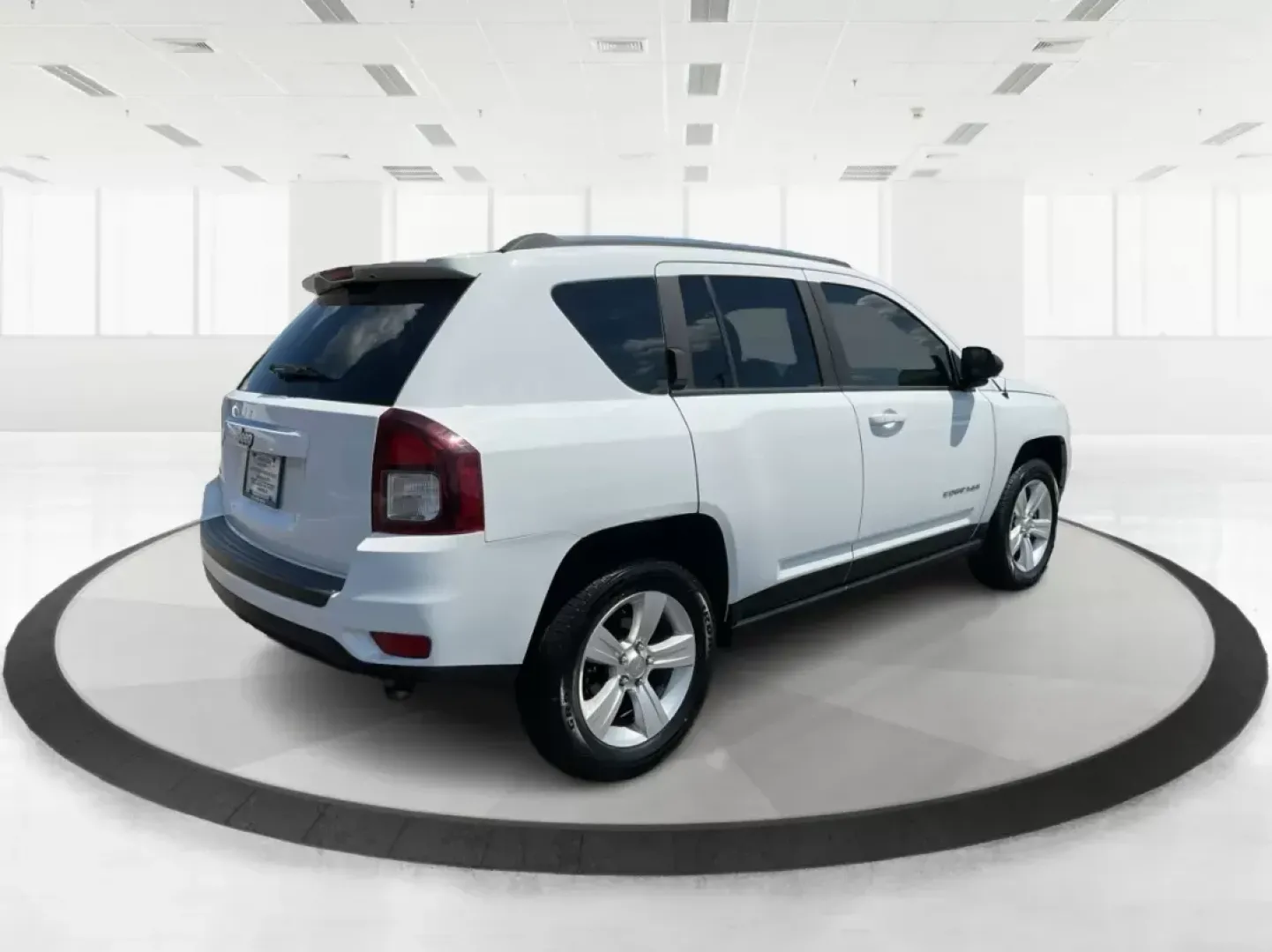 2014 Jeep Compass Sport (1C4NJDBB6ED) with an 2.4L I-4 DOHC engine, located at 401 Woodman Dr, Riverside, OH, 45431, (937) 908-9800, 39.760899, -84.123421 - **Discover Your Next Adventure with the 2014 Jeep Compass Sport at Advantage Car and Credit!**<br /> <br /> Are you ready to elevate your driving experience? Whether you're a weekend adventurer, a busy commuter, or a growing family seeking reliability, the 2014 Jeep Compass Sport is the perfect comp - Photo#2
