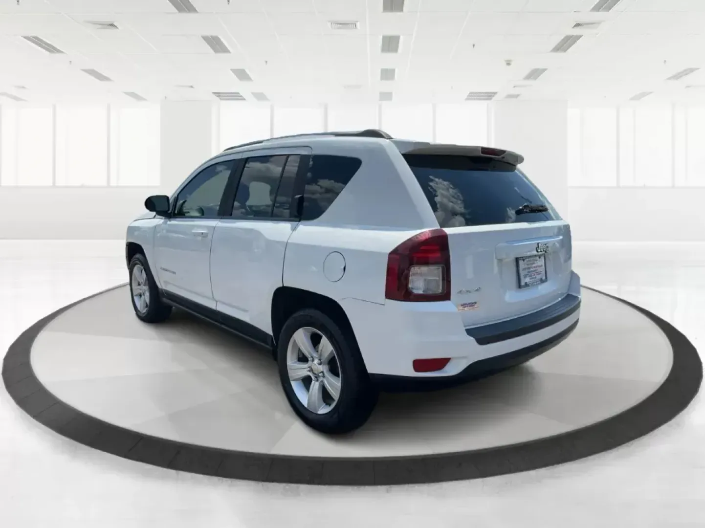 2014 Jeep Compass Sport (1C4NJDBB6ED) with an 2.4L I-4 DOHC engine, located at 401 Woodman Dr, Riverside, OH, 45431, (937) 908-9800, 39.760899, -84.123421 - **Discover Your Next Adventure with the 2014 Jeep Compass Sport at Advantage Car and Credit!**<br /> <br /> Are you ready to elevate your driving experience? Whether you're a weekend adventurer, a busy commuter, or a growing family seeking reliability, the 2014 Jeep Compass Sport is the perfect comp - Photo#4