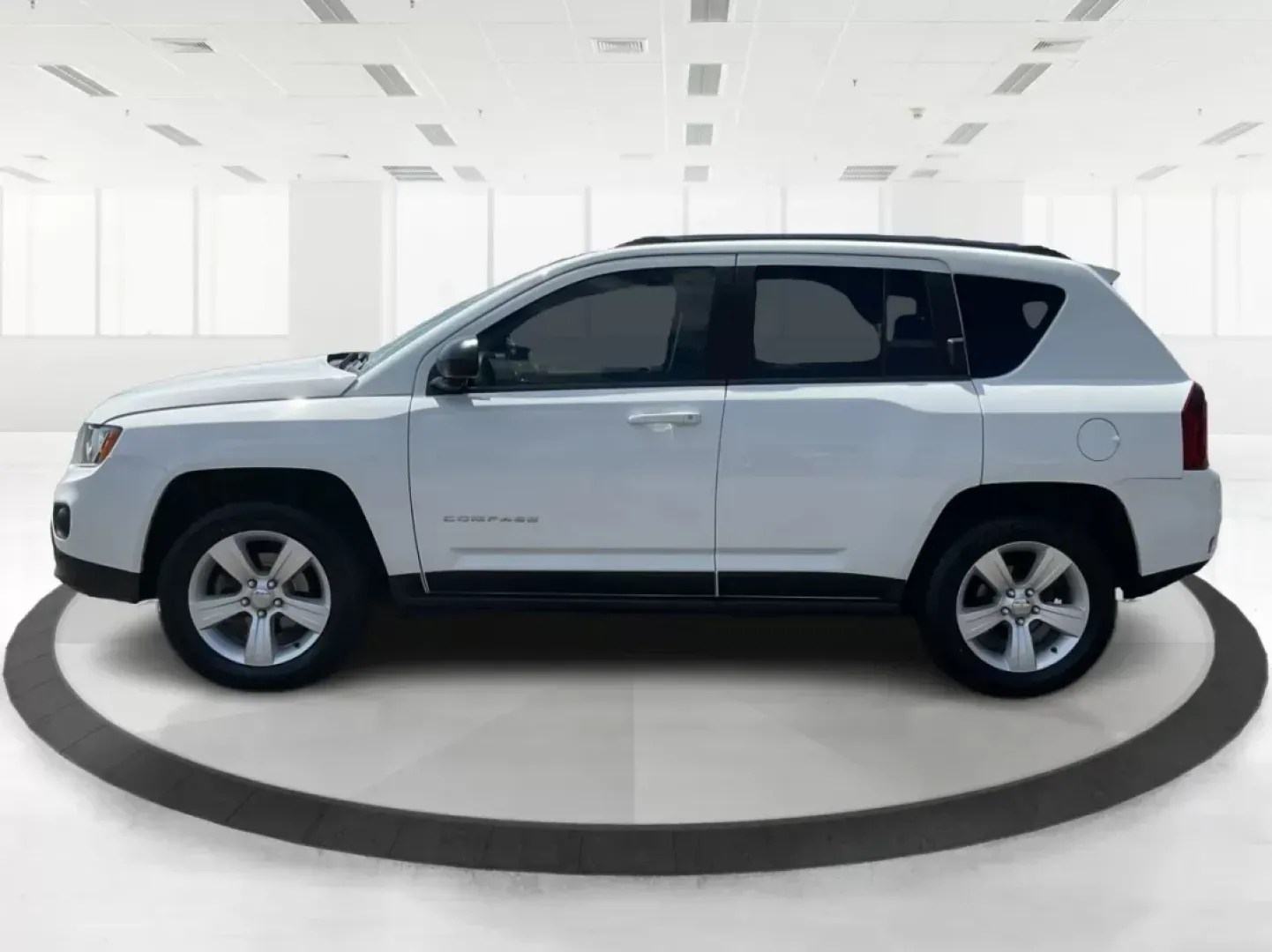 2014 Jeep Compass Sport (1C4NJDBB6ED) with an 2.4L I-4 DOHC engine, located at 401 Woodman Dr, Riverside, OH, 45431, (937) 908-9800, 39.760899, -84.123421 - **Discover Your Next Adventure with the 2014 Jeep Compass Sport at Advantage Car and Credit!**<br /> <br /> Are you ready to elevate your driving experience? Whether you're a weekend adventurer, a busy commuter, or a growing family seeking reliability, the 2014 Jeep Compass Sport is the perfect comp - Photo#5