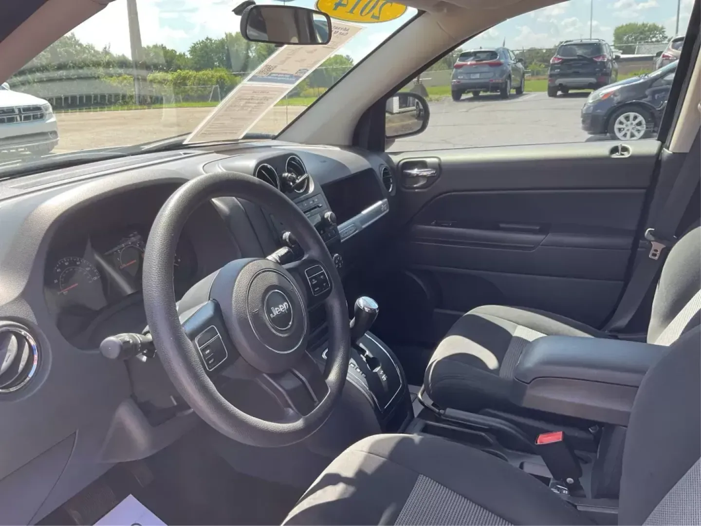 2014 Jeep Compass Sport (1C4NJDBB6ED) with an 2.4L I-4 DOHC engine, located at 401 Woodman Dr, Riverside, OH, 45431, (937) 908-9800, 39.760899, -84.123421 - **Discover Your Next Adventure with the 2014 Jeep Compass Sport at Advantage Car and Credit!**<br /> <br /> Are you ready to elevate your driving experience? Whether you're a weekend adventurer, a busy commuter, or a growing family seeking reliability, the 2014 Jeep Compass Sport is the perfect comp - Photo#8