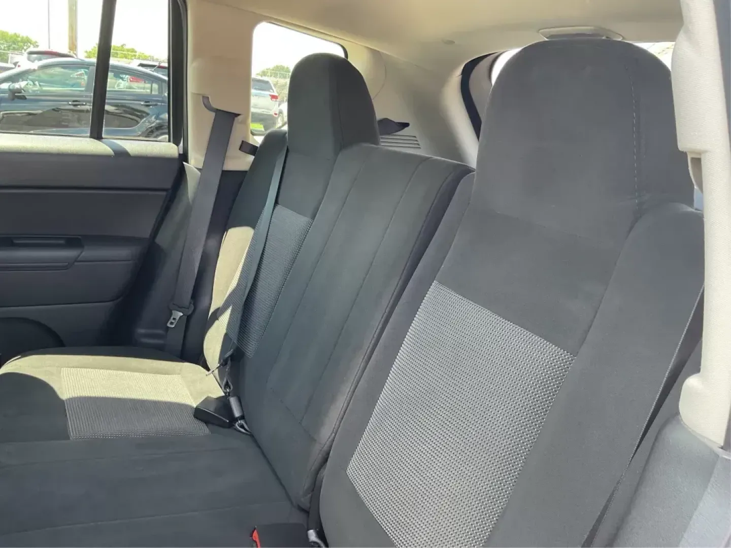 2014 Jeep Compass Sport (1C4NJDBB6ED) with an 2.4L I-4 DOHC engine, located at 401 Woodman Dr, Riverside, OH, 45431, (937) 908-9800, 39.760899, -84.123421 - **Discover Your Next Adventure with the 2014 Jeep Compass Sport at Advantage Car and Credit!**<br /> <br /> Are you ready to elevate your driving experience? Whether you're a weekend adventurer, a busy commuter, or a growing family seeking reliability, the 2014 Jeep Compass Sport is the perfect comp - Photo#9