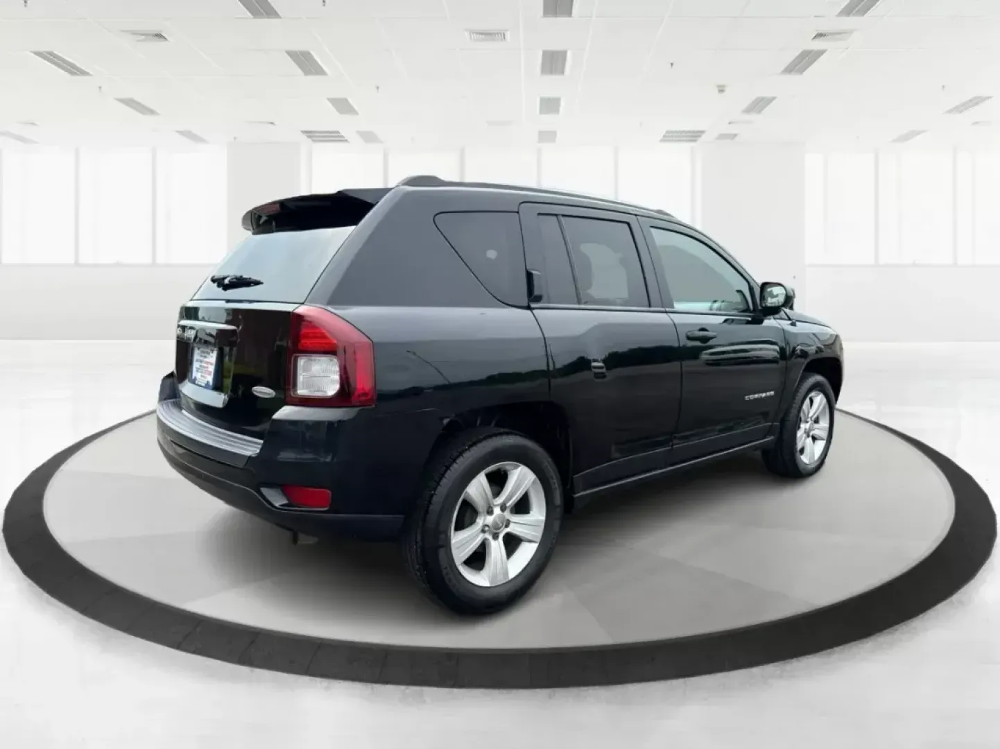 2014 Jeep Compass Latitude (1C4NJCEB4ED) with an Other engine, located at 1099 N County Rd 25A, Troy, OH, 45373, (937) 908-9800, 40.057079, -84.212883 - **Adventure Awaits in This Versatile 2014 Jeep Compass Latitude! Ideal for Family Outings and Weekend Getaways!**<br /> <br /> Are you ready to elevate your lifestyle with a vehicle that seamlessly fits into your adventures? Look no further than this robust 2014 Jeep Compass Latitude, available now - Photo#2